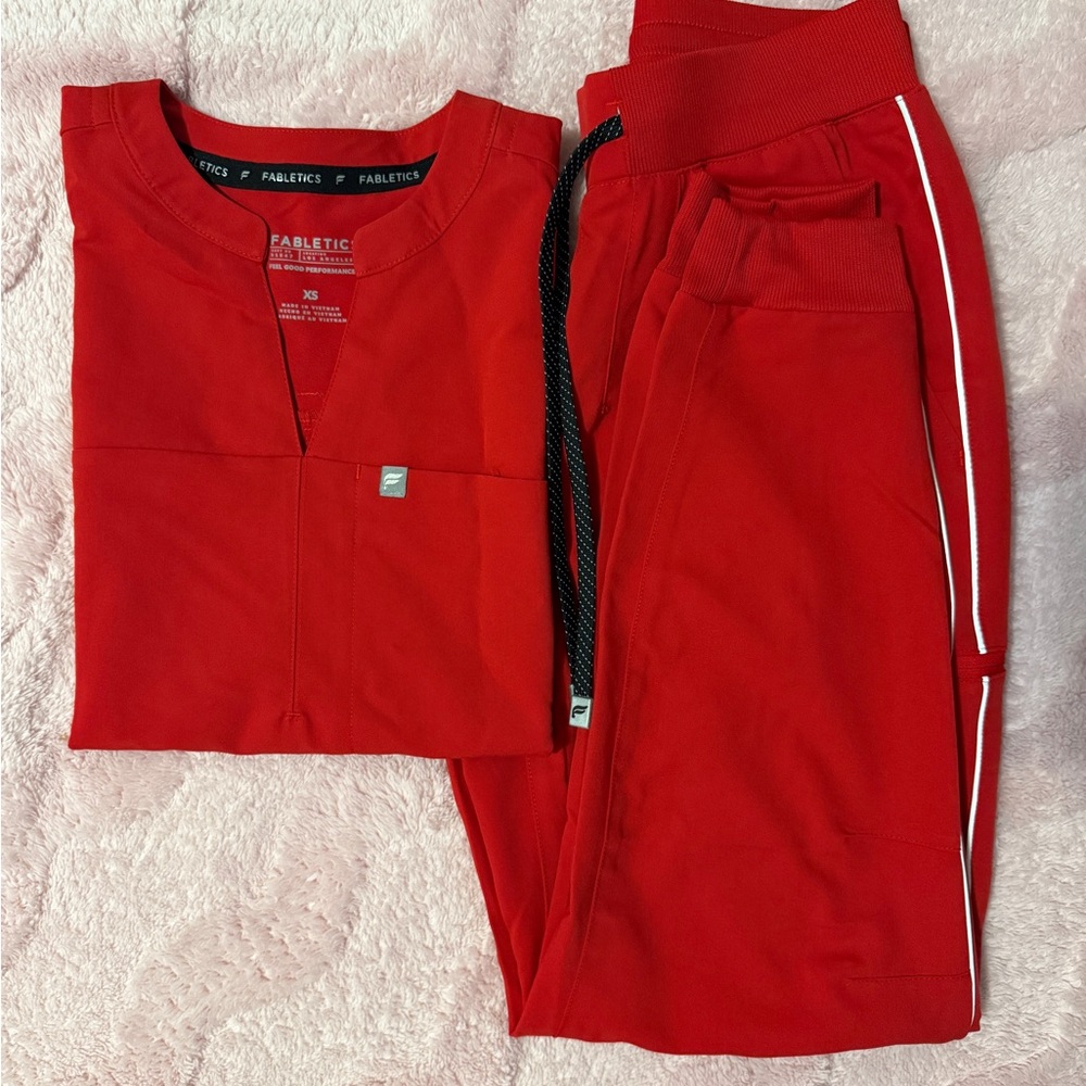 Fabletics scrubs set in color Goji Red